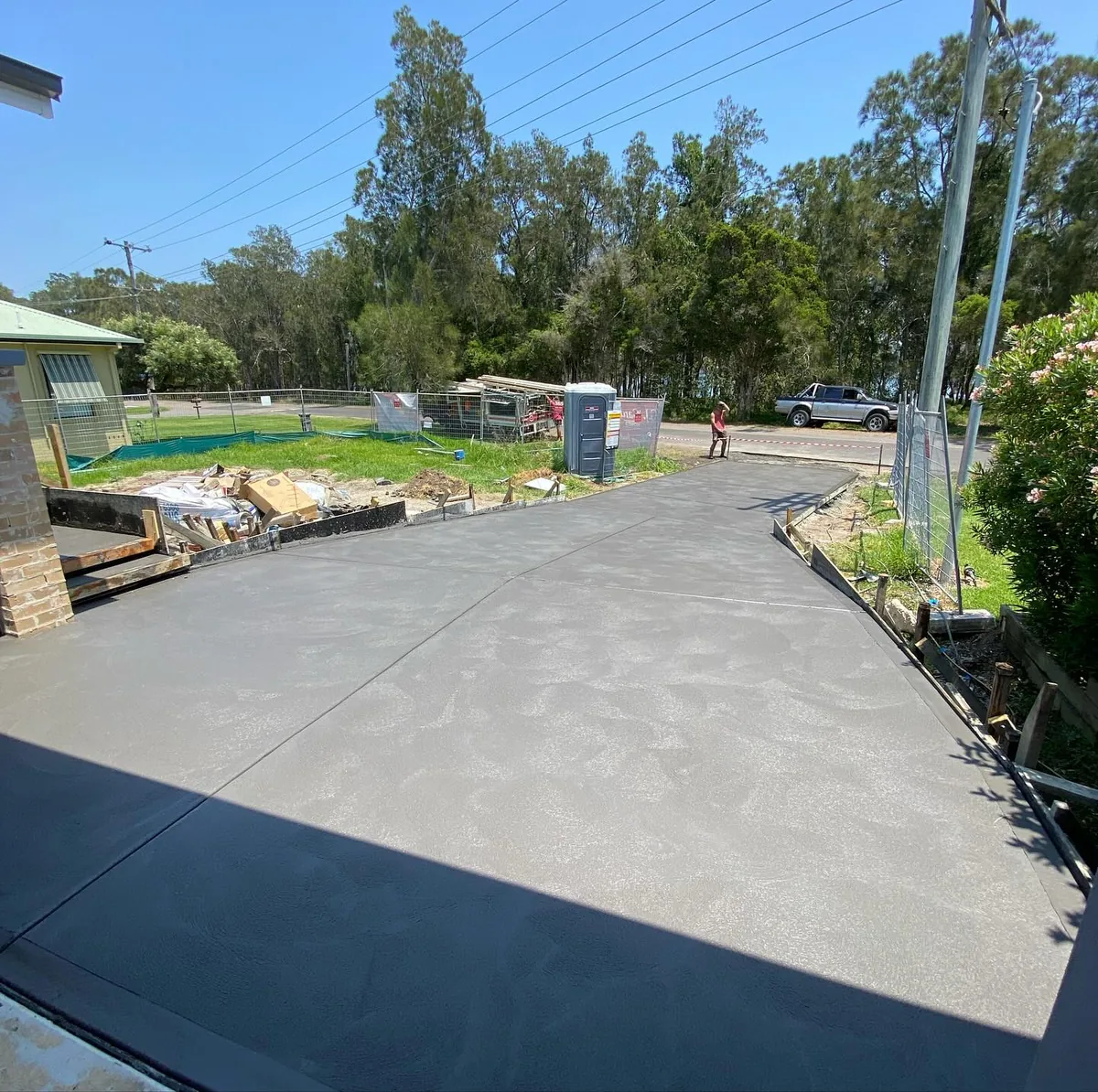 Charcoal-finished driveway in semi-rural Newcastle setting