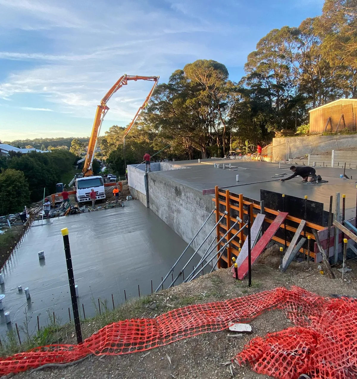 Concrete pump truck on hillside pour