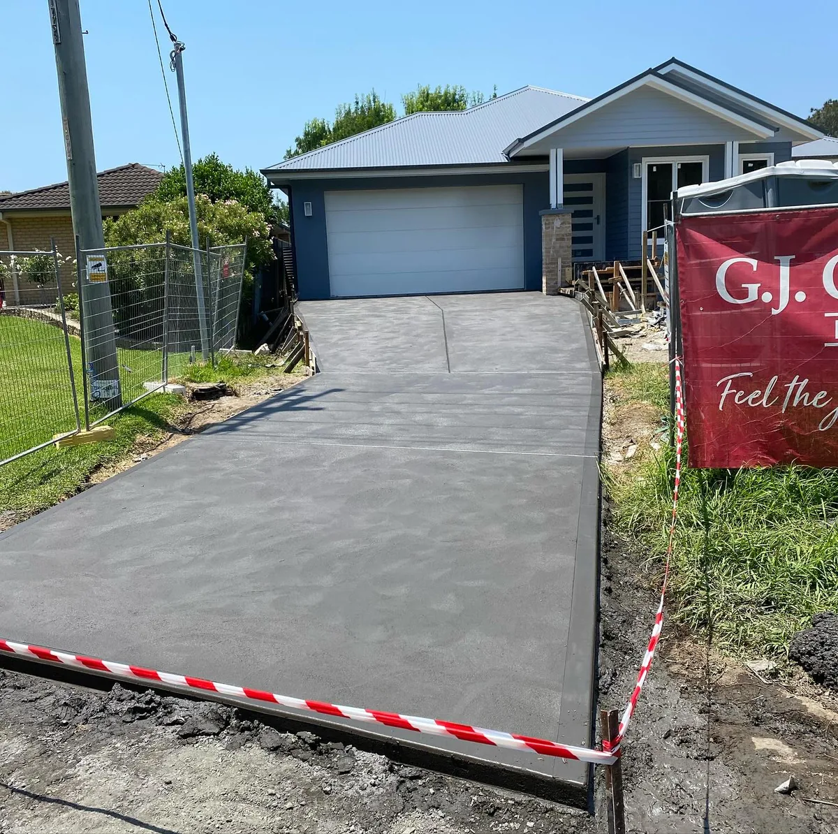 Suburban driveway pour, freshly finished